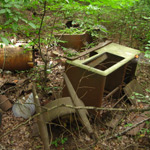 5 Ways to Tell If That Pile of Garbage You Found in the Woods Is a Moonshine Still